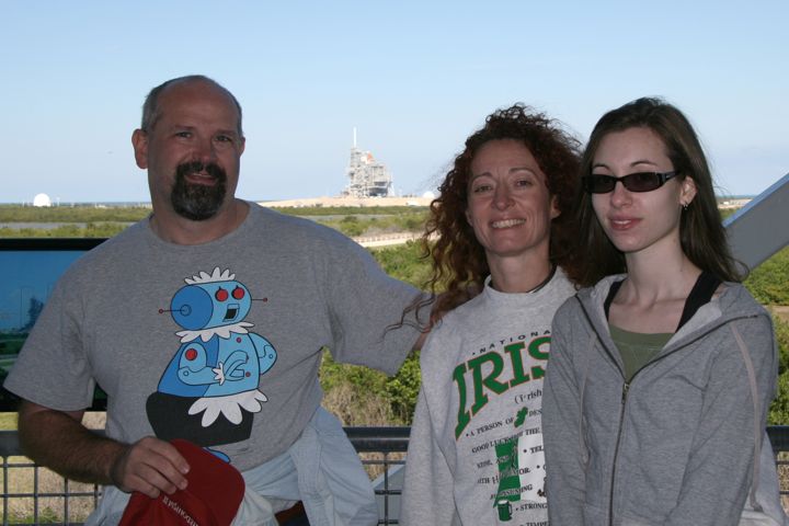 Family with pad 39A in the background