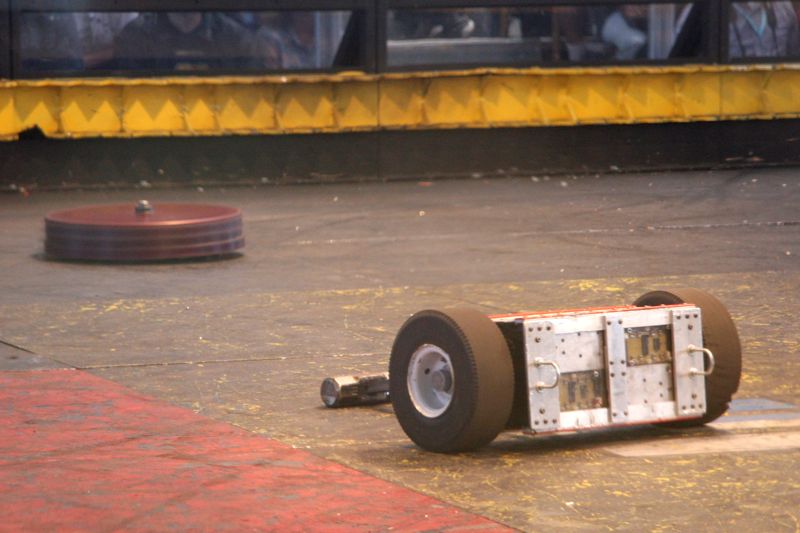 Cornholio (red) vs Herr Gepounden.  Herr Gepounden and Ice Cube are the two oldest robots in the competition (both started in Season 3 of BattleBots)