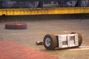 Cornholio (red) vs Herr Gepounden.  Herr Gepounden and Ice Cube are the two oldest robots in the competition (both started in Season 3 of BattleBots)