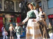 Costumed figures on stilts in the Gothic Quarter of Barcelona (By Dan)