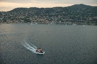 A tender returning from Villefranche