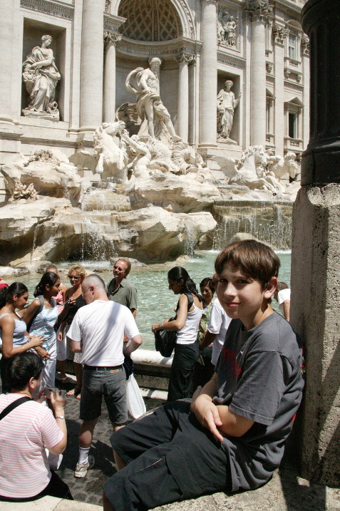 Dan relaxes at Trevi Fountain